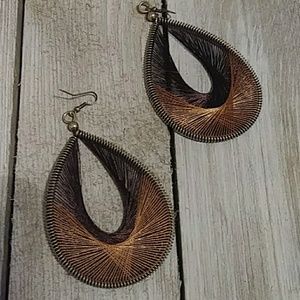 Large brown woven teardrop-shaped earrings